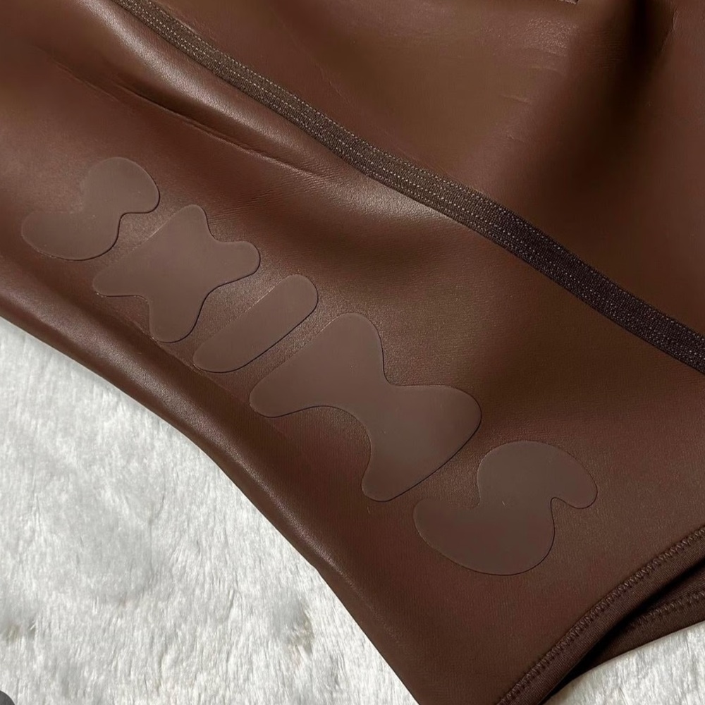 SKIMS RUBBERIZED STRAPLESS SWIMSUIT - Picture 2 of 5